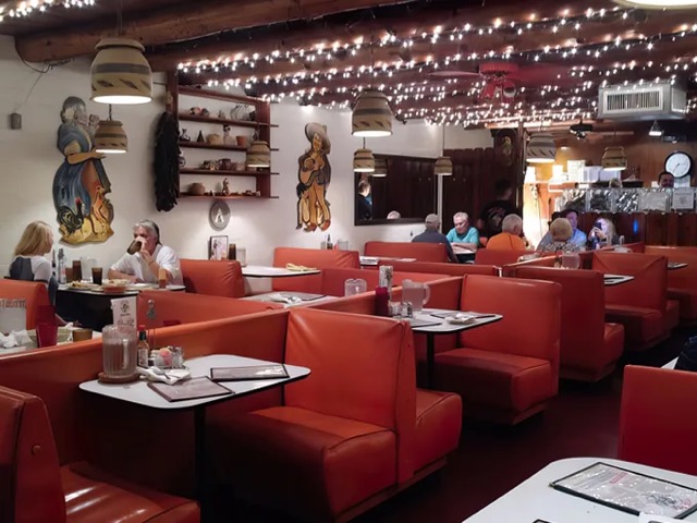 Restaurant interior with red booths